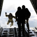 Rescuemen Jump Out of Plane (USCG)
