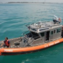 Boat Crew Retrieves Part from CGC Eagle (USCG)