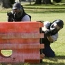 FLETC agents practice shooting and taking cover