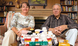 Susanna and John Dodson looking at there prescription drugs.