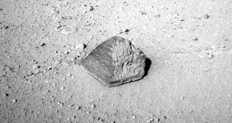 The drive by NASA's Mars rover Curiosity during the mission's 43rd Martian day, or sol, (Sept. 19, 2012) ended with this rock about 8 feet (2.5 meters) in front of the rover.