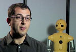 Bilge Mutlu and robot that looks like humans.