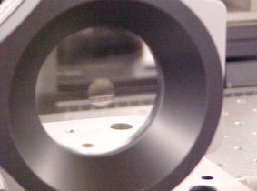 Nested zone plate with two primary focal lengths to measure the radius of curvature of a mirror with a 10 meter radius.