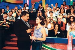 Don Francisco speaking to a woman