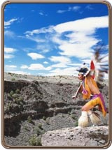 Collection: The Image Bank - USA, New Mexico, Native American man by canyon, arms outstretched, Taos County.