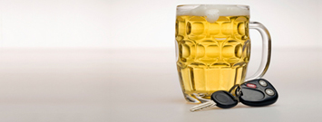 Photo: A glass of beer and car keys