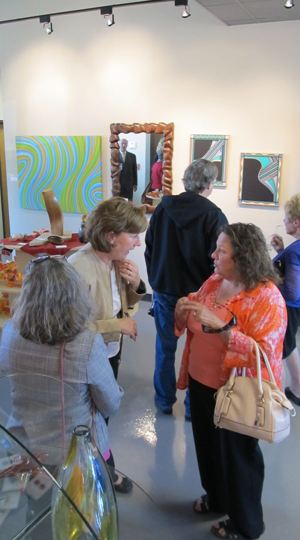 Kathy Byrnes (center) of Village Canvas and Cabernet