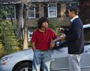 Photo: father handing son the car keys