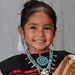 Young girl in the traditional dress of the Diné (Navajo) nation