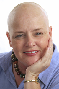 woman without hair smiling