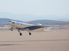 The remotely operated X-48C Blended Wing Body aircraft lifts off Rogers Dry Lake at Edwards Air Force Base, Calif., on its first test flight Aug. 7.