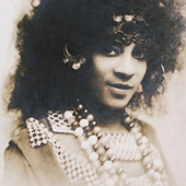 Postcard of Kathlyn Jones, wearing elaborate jewelry and costume. Schomburg Center for Research in Black Culture.