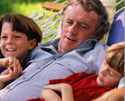 Dad with kids on a hammock