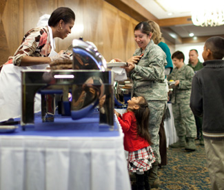 First Lady Michelle Obama participates in a service project.