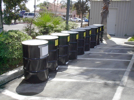 Empty and Unused 55-Gallon Drums Outside of an Industrial Facility
