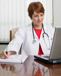 Photo: A healthcare professional at a computer