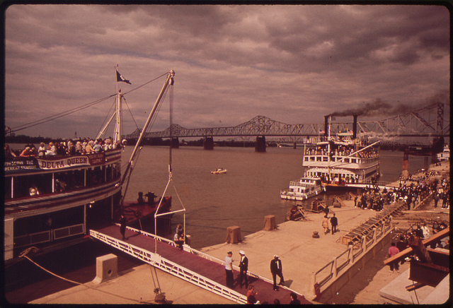 DOCUMERICA: Paddle wheel steamboats, docked at the new Louisville waterfront on the Ohio River, May 1972 by William Strode.