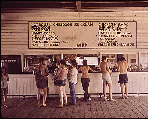 DOCUMERICA: A refreshment stand on the boardwalk of Isle of Palms, the popular ocean resort, 05/1973 Paul Conklin (1929-2003).