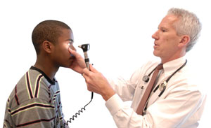 Doctor checking patient's eyes