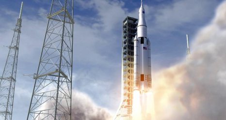 Artist concept of the NASA Space Launch System initial crew vehicle launching from the Kennedy Space Center.