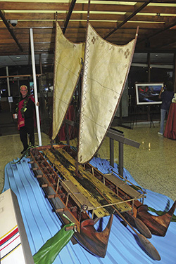 Tay Perry with Hokulea canoe