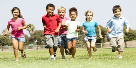 Image of children running in field