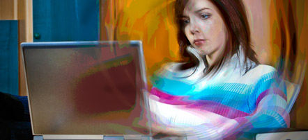 photo of female college student at laptop