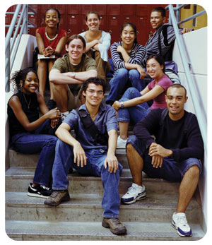 Group of teens sitting on steps.