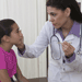 health professional examining student