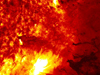 Closeup of the sunspot behind the June 7, 2011 solar blast, as plasma from the blast rains back down.