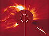 Merged stills from the video show the approach of the comet on the right and the CME on the left.
