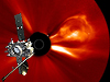 Artist illustration of STEREO spacecraft superimposed over an image taken by STEREO of a coronal mass ejection (CME) that occurred on May 20, 2011.