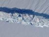 A close-up image of the crack spreading across the ice shelf of Pine Island Glacier shows the details of the boulder-like blocks of ice that fell into the rift when it split.