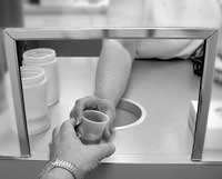 photo of health care worker administering medication