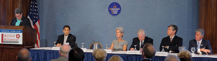 photo of public and private sector officials at a press conference