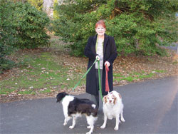 A Photo of Rita Smith of Lorton, Va walking her two dogs.