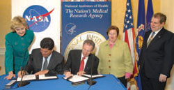 NIH Director Dr. Elias A. Zerhouni and NASA Administrator Dr. Michael D. Griffin
