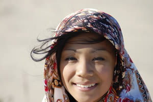 Photo: A girl wearing a head scarf