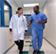 doctors walking down a hospital corridor