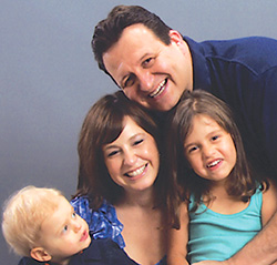 Jay Hobby with his wife and two children