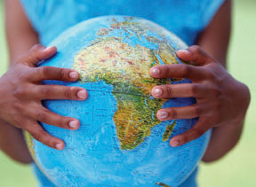 Hands holding a globe