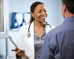 A Doctor speaking to a patient
