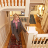 Photo: Woman walking up stairs