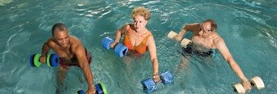 Older Adults Swimming In Pool