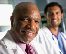 Photo: two smiling doctors