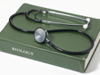 Stethoscope and biology book.