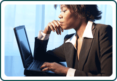 A woman at her computer.