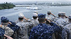 Sailors & Marines salute USS Arizona Memorial.