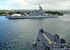 USS Rushmore passes the Battleship Missouri.