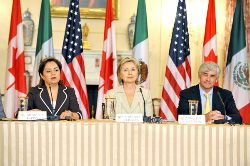 Date: 07/16/2009 Location: Washington, DC Description: Secretary Clinton hosted a North American Trilateral Ministerial Meeting in the Benjamin Franklin Room of the Department of State.  She is joined by Mexican Foreign Relations Secretary Patricia Espinosa Cantellano and Canadian Foreign Minister Lawrence Cannon. State Dept photo by Michael Gross
© State Dept Image by Michael Gross